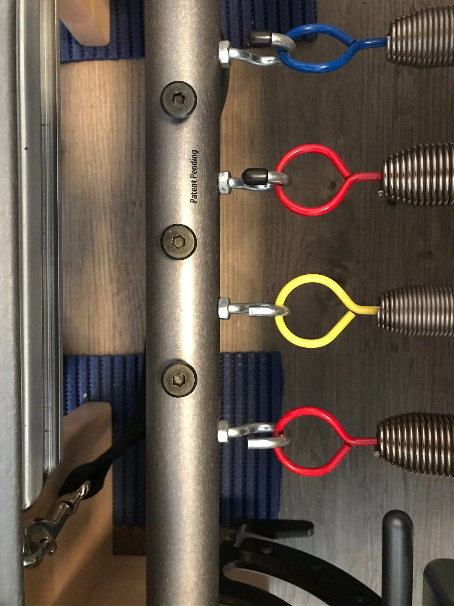 Coloured springs on Pilates equipment